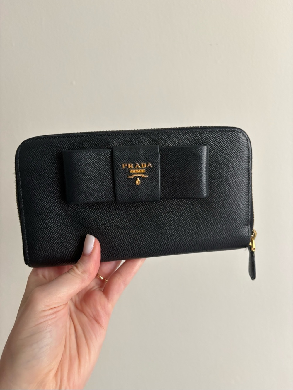 Prada Black Saffiano Leather Zippie Wallet with Bow and Gold Logo